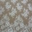 French bridal lace fabric with floral embroidery, crystals, and beads
